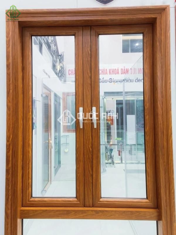 Cửa sổ kính khung nhôm vân gỗ.