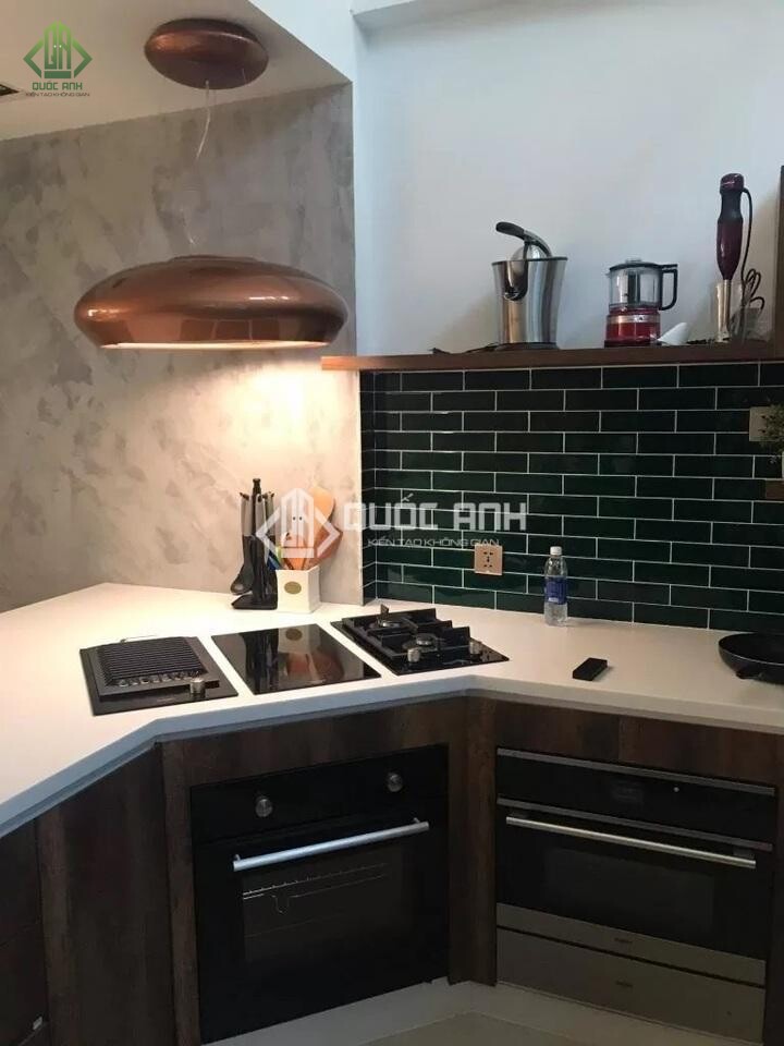 Tủ bếp góc xéo đơn giản.